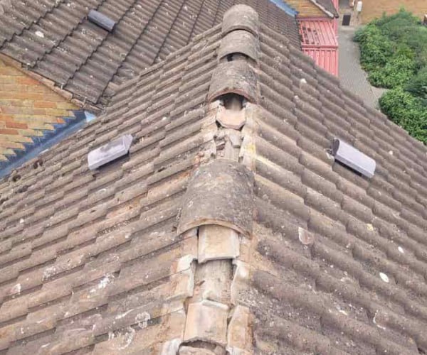 This is a photo if a roof ridge which has missing tiles. The ridge tiles are being replaced by FCB Roofing Cranfield